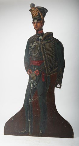 Carved Wood Umbrella Holder: Hussar figure. Polychromed. Has a cast iron holder with a wooden tray at the back side. Provenance: Sotheby's ; 39"