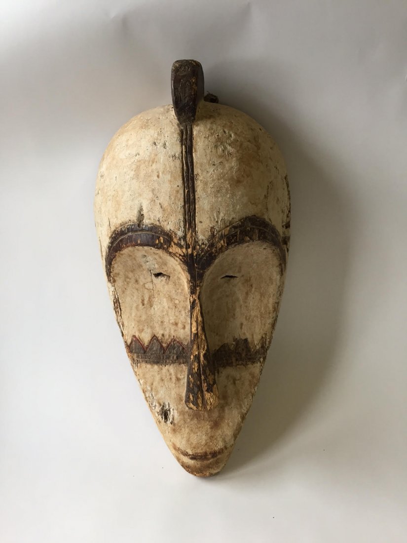 Antique African Mask: Large painted carved wood mask; 22in. H. x 11in. W.