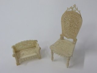 Antique Carved Scrimshaw Miniature Chairs: One a high backed chair and one a miniature settee. Perhaps sailor's work. 3" and 1"H.