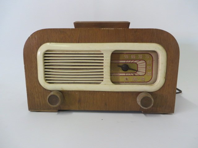 Philco Radio: Model 42-PT 95 1942. Wood, Plastic. Brown,Cream. Transitone; Right Dial; left plastic grill, escutcheon. Bunis I Pg. 113