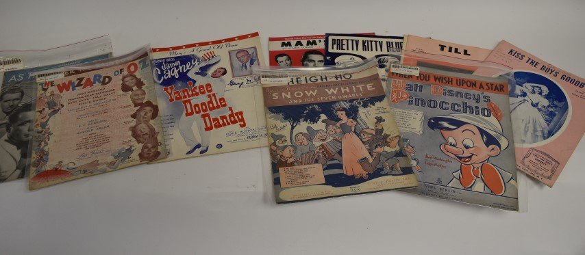 1940's and Other Pop Sheet Music: The lot includes approx. 25 pcs. Sheet music inc. many with excellent graphics. Some shrink wrapped.