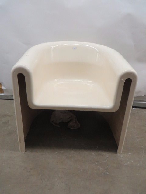 Mid Century Chair-Paul McCobb: Egg shell colored armchair. Molded fiberglass. Paul McCobb. 24"H. overall 26"W. (some crazing)