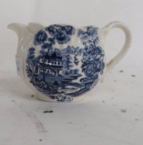 Clarice Cliff Creamer: Marked Royal Staffordshire Dinnerware by Clarice Cliff. Made in England. 2 1/2"H. x 4"W