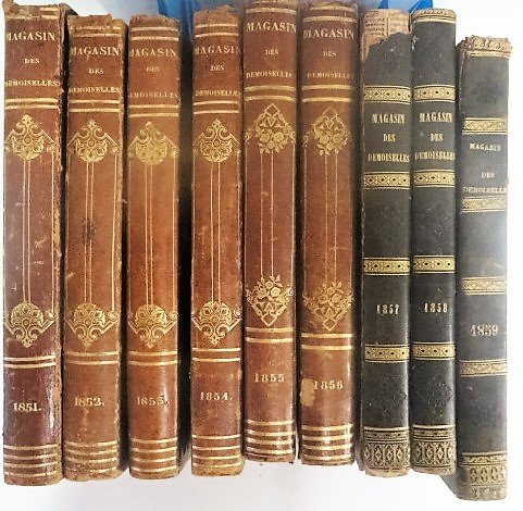 Magasin Des Demoiselles Paris: 1851, 1852-1853, 1854, 1855, 1856, 1858. Tome Neuvieme Paris. Colored fashion plates. Leather and marbleized spine and boards. Gold tooled.