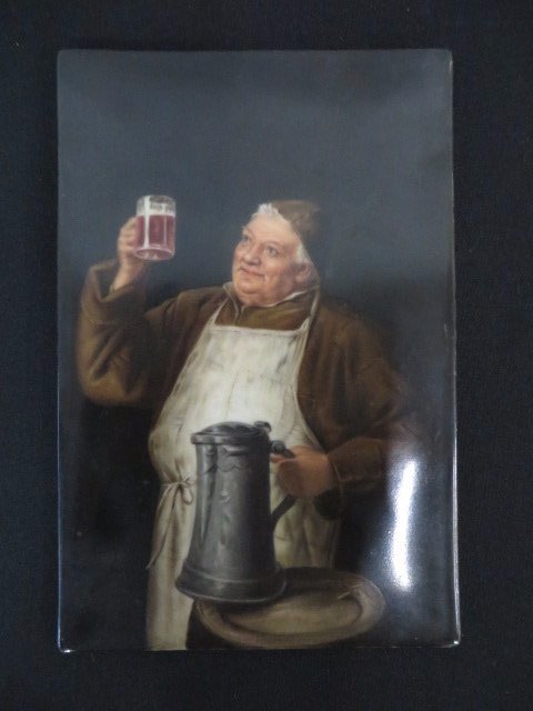 German Painting on Porcelain: Monk with a pint of beer in a tavern setting 8 1/2"H. x 5 1/2"W