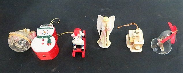 Christmas Ornaments. Estate of Liberace: Box lot of Christmas ornaments to include many wooden rocking horses, drums, boxes, candleholders. Etc. More than 100 items in the lot. With provenance.