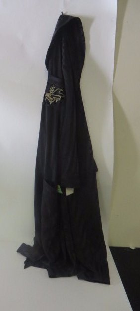 Liberace Silk robe: Embroidery of a piano and a candelabra on the robe a the chest area.. Embroidered Love, Lee G. H. at the inside collar