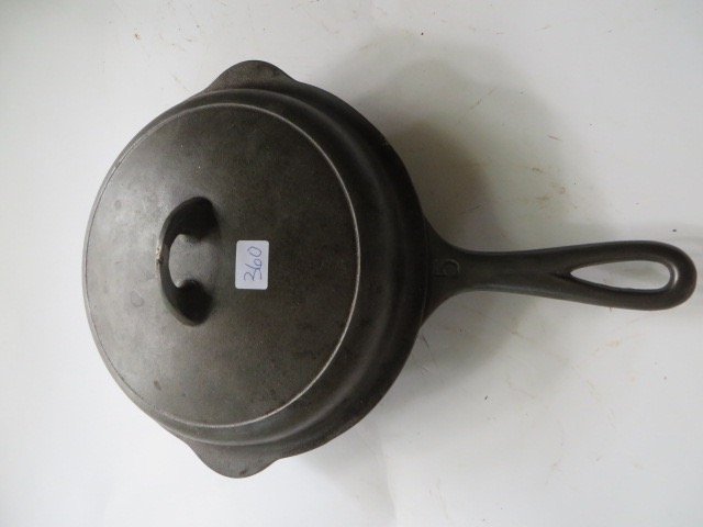 Griswold Cast Iron Covered Skillet.: Marked Griswold 1095 on the inside of the lid. Markings on the bottom as well, Griswold 5 and 724L Heat ring