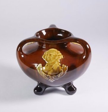 Redware George Washington Vase: Redware George Washington vase. Tri-footed . Triple Handled. Three portraits of George Washington No markings. Purchased at Methuselah Antiques in Feb. of 1973.. 6"H. 3 1/4"D at the mouth.