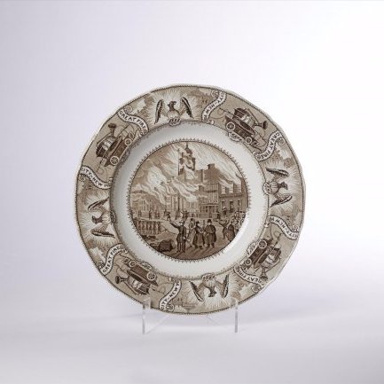 Plate. Great Fire City of New York: Ironstone soup dish with transfer in sepia of N.Y. Stock Exchange Fire. C. 1836-1840 Marked at the back with an eagle, a D and Stone Ware Exchange, New York With Provenance to Ruth Troiani, Pound Ridg