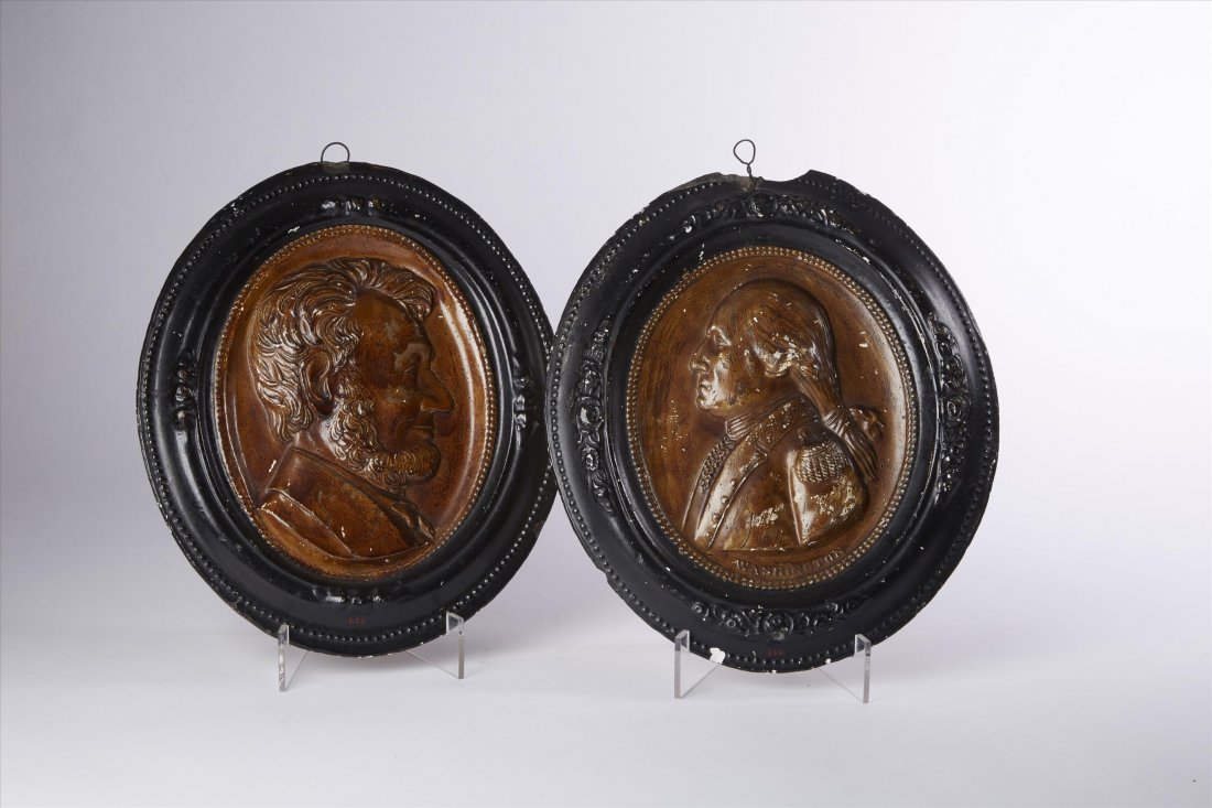 Lincoln & Washington Plaques: Abraham Lincoln and George Washington oval painted plaster portrait plaques. 10 1/2"h. x 9"W.