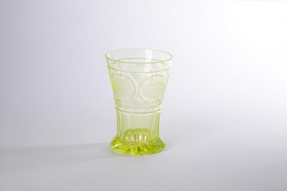 Austrian Etched Glass Beaker: Vienna, Mid-19th C., the tapering cup with a band of cut reserves depicting various buildings, "Neubad Steinbad Stadtbad and Scglangenbad and the phrase Zum Andenten over a faceted base and scalloped 