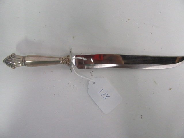 Georg Jensen Sterling Knife: Georg Jensen Carving knife. Sterling handle marked George Jensen and Sterling. Stainless steel blade. 13 1/4"L.