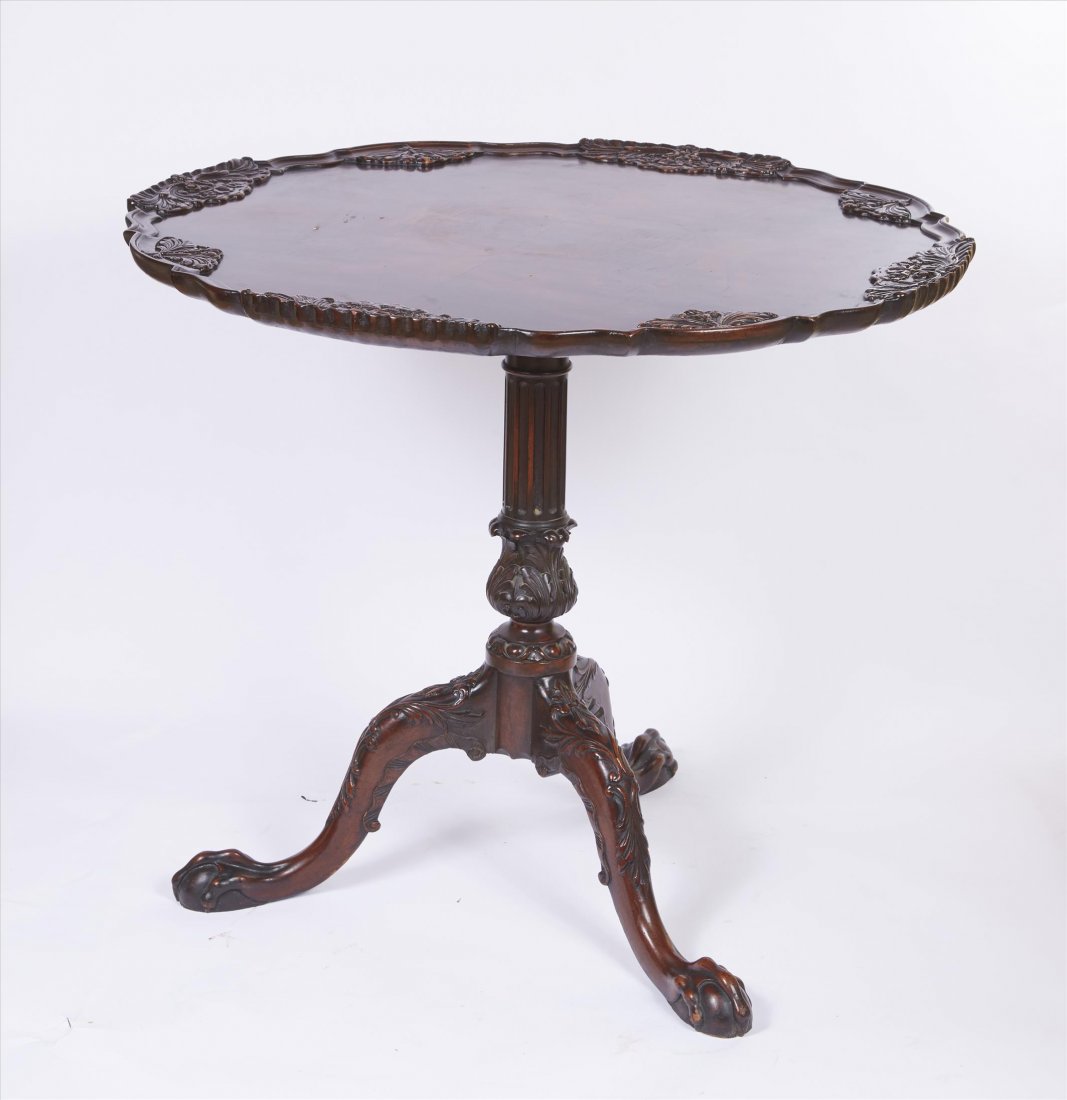 Mahogany Pie Crust Tilt Top Table: Ball and Claw feet. Well carved. 29"H. 33"D