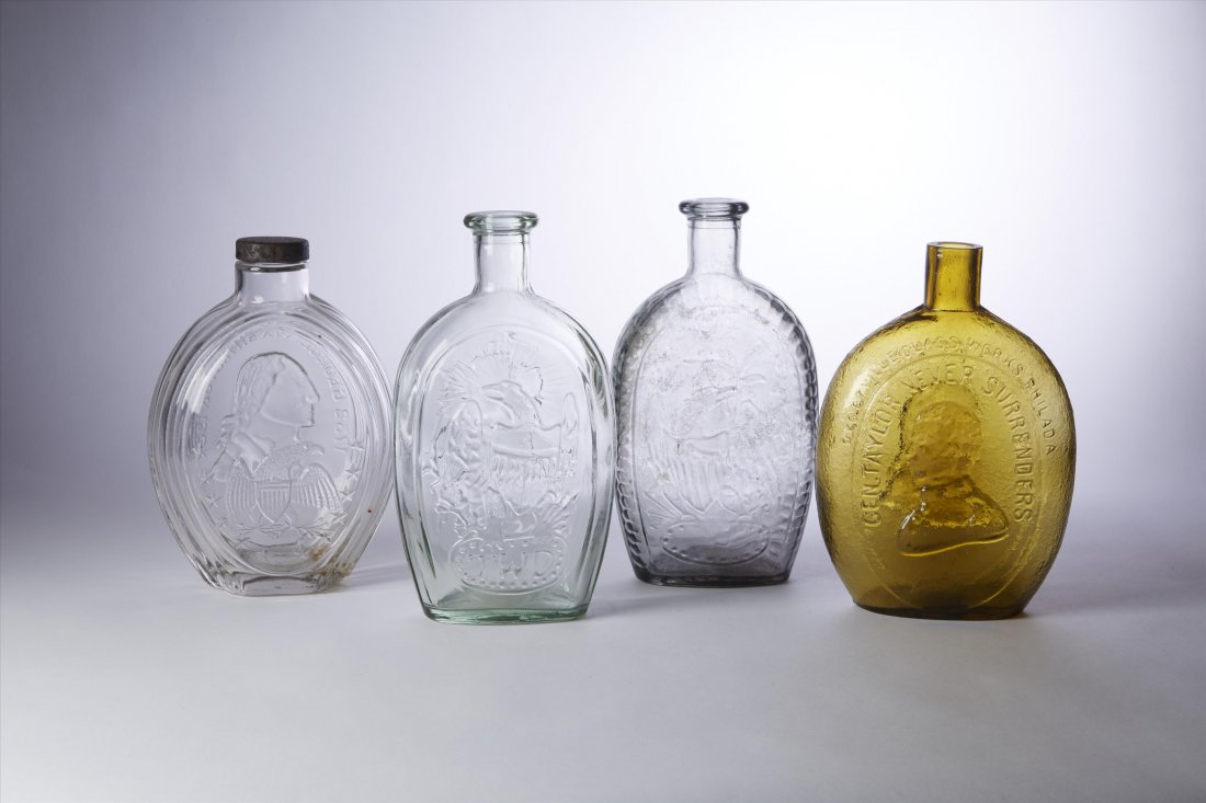 American Historical Bottles (4): Clear George Washington "The Father of His Country Amber . Benjamin Taylor Never Surrendered" and two Franklin bottles. Oyottville Glass Works. 9"H. to 8"H.
