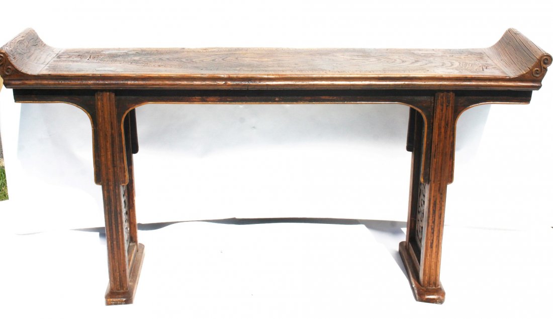 Chinese Carved Teakwood Altar Table: Carved teakwood altar table. Carved openwork sides; 37in.H. x 71in.W. x 14in.D.