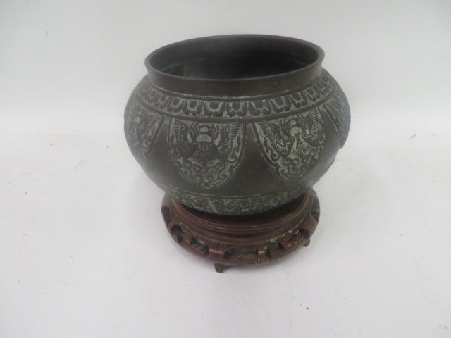 Antique Bronze Korean Vessel: On a carved teakwood stand. 5 inches H.(vase)