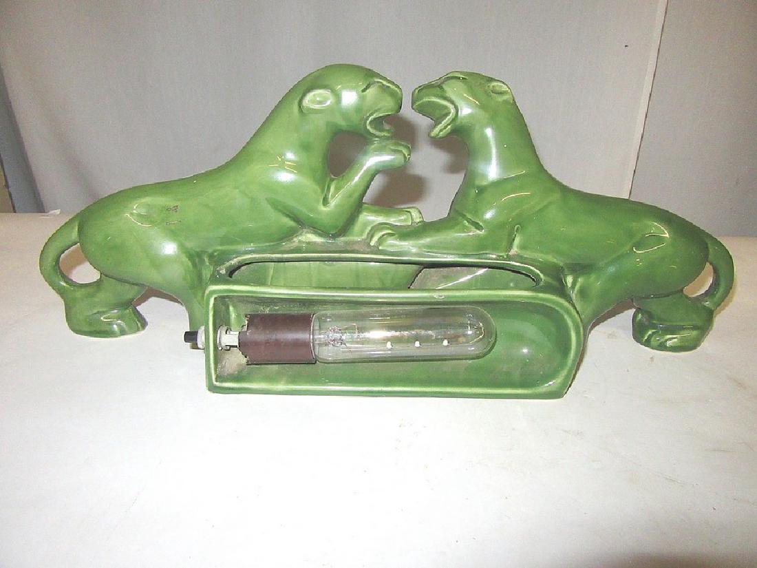 Mid-Century Modern Panther Lamp: Lights from the back.