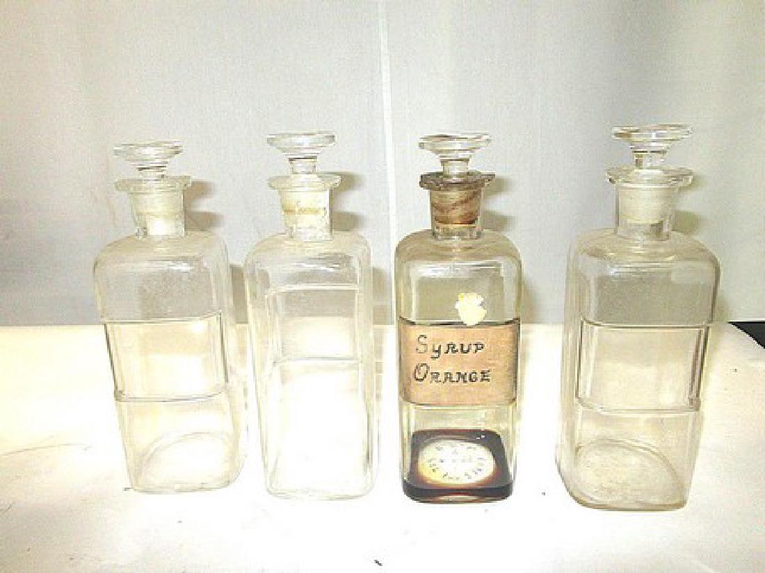 Medical Apothecary Jars. (4): No labels on three. One has a hand written for Orange Syrup. 8 1/2"H.