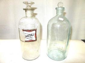 Apothecary Jars. (2): Affixed label as is. One without a label. 12"H.