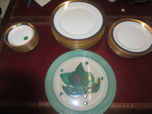 Dealer's Lot of China: The lot is comprised of a set of gold trimmed dishes by Pope-Gossner U.S.A.,Approx.. 21 pcs. in the lot and a floral decorative plate . This description was altered on Feb. 2nd as much of previously c