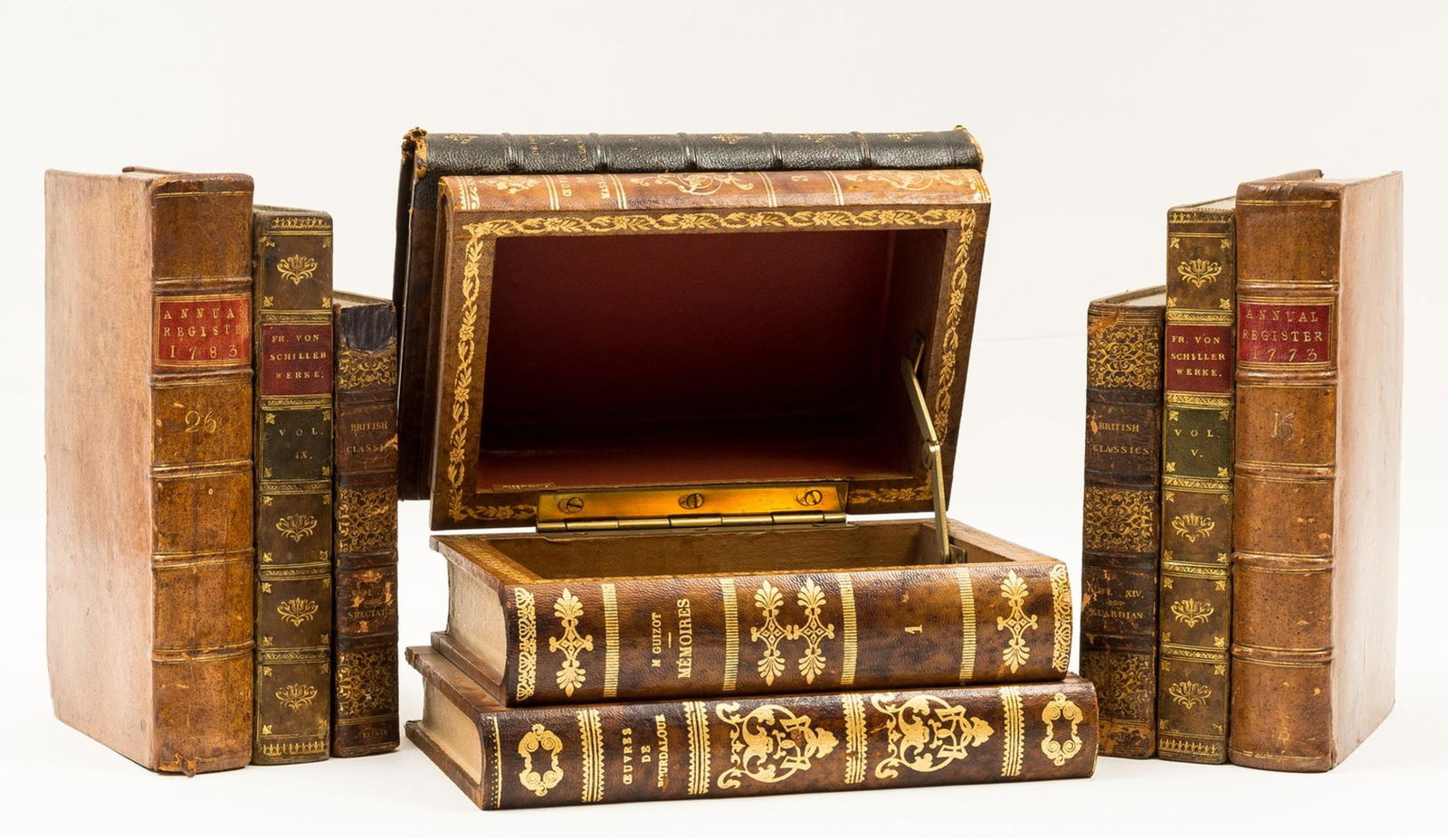 Bindings.-  Inkwell, wooden box impersonating books, [early 20th century]; and book-ends in similar (1 of 1)