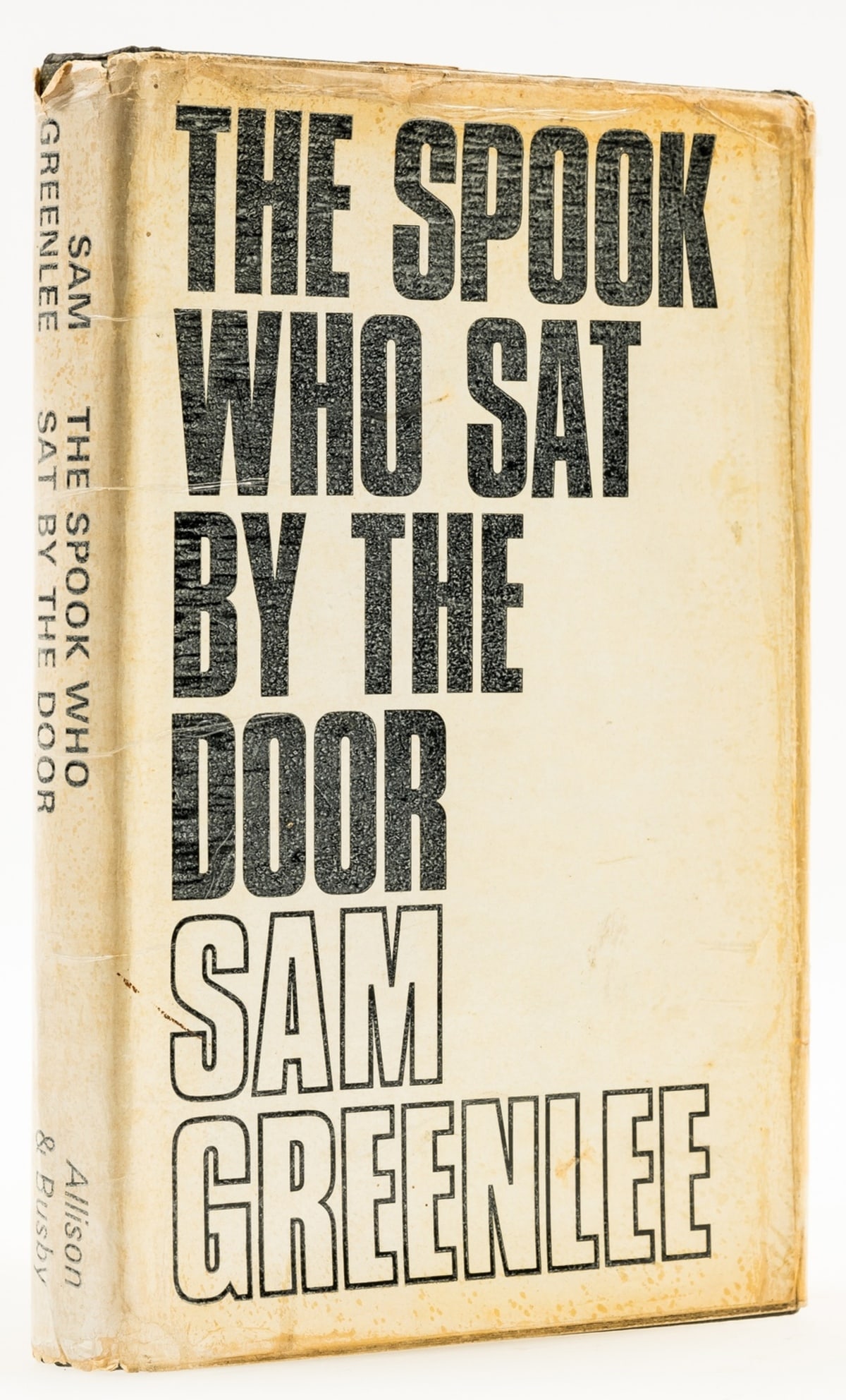 Greenlee (Sam) The Spook Who Sat by the Door, first edition, 1969.: Greenlee (Sam) The Spook Who Sat by the Door, first edition, faint damp-staining, original boards, dust-jacket, lightly toned and browned, creased and nicked at upper edge, lightly frayed, 8vo, 1969.