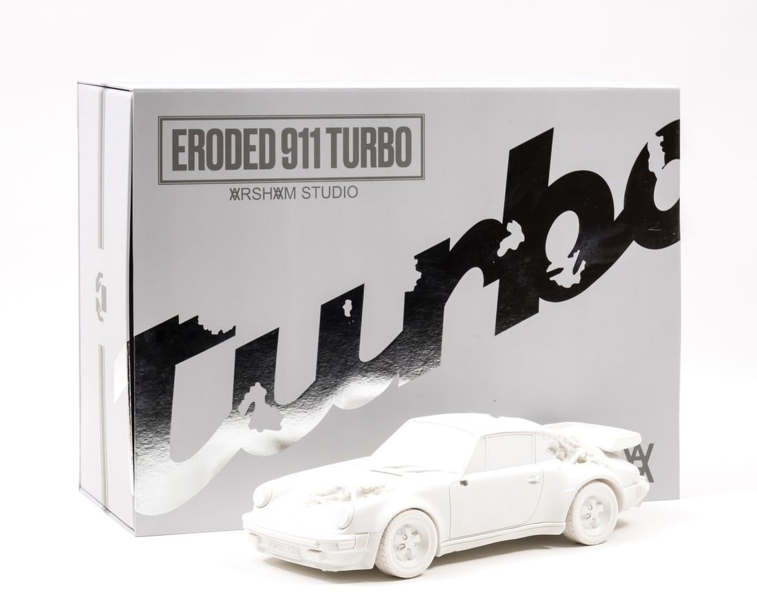 Daniel Arsham (b.1980) Eroded 911 Turbo (Porsche): Daniel Arsham (b.1980)Cast selenite multiple with quartz specimens, 2020, from the edition of 500, published by Arsham Studios, New York, with the original foam-lined presentation box and a signed cop