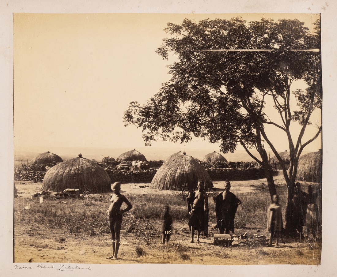 World.- [Photograph Album], c.95 vintage photographs, c.1910-20: [Photograph Album], c.95 vintage photographs pasted onto thick card leaves, some captioned in negative, some captioned in manuscript on leaves, spotting and dust soiling, contemporary half morocco