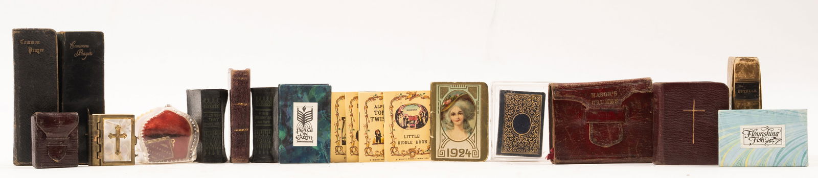 Miniature Books.- Collection of 19 miniature books housed in a book box, [19th century & later]. (1 of 2)