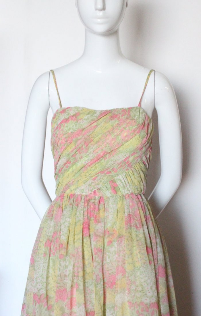 Larry Aldrich Floral Chiffon Maxi Dress,1970's: Larry Aldrich Floral Chiffon Maxi Dress,1970's. Bodice is lined with matching pattern lining. Armpit to armpit 16", Waist 12"