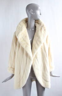 Fendi Couture Beige Mink Fur Coat, F/W 1983: Fendi Roma by Karl Lagerfeld for Bergdorf Goodman Couture Beige Mink Fur Coat, F/W 1983. Made in Italy. Hand written Bergdorf Goodman label sewn behind the Fendi label reads 'McEntee/Date 12/83'.