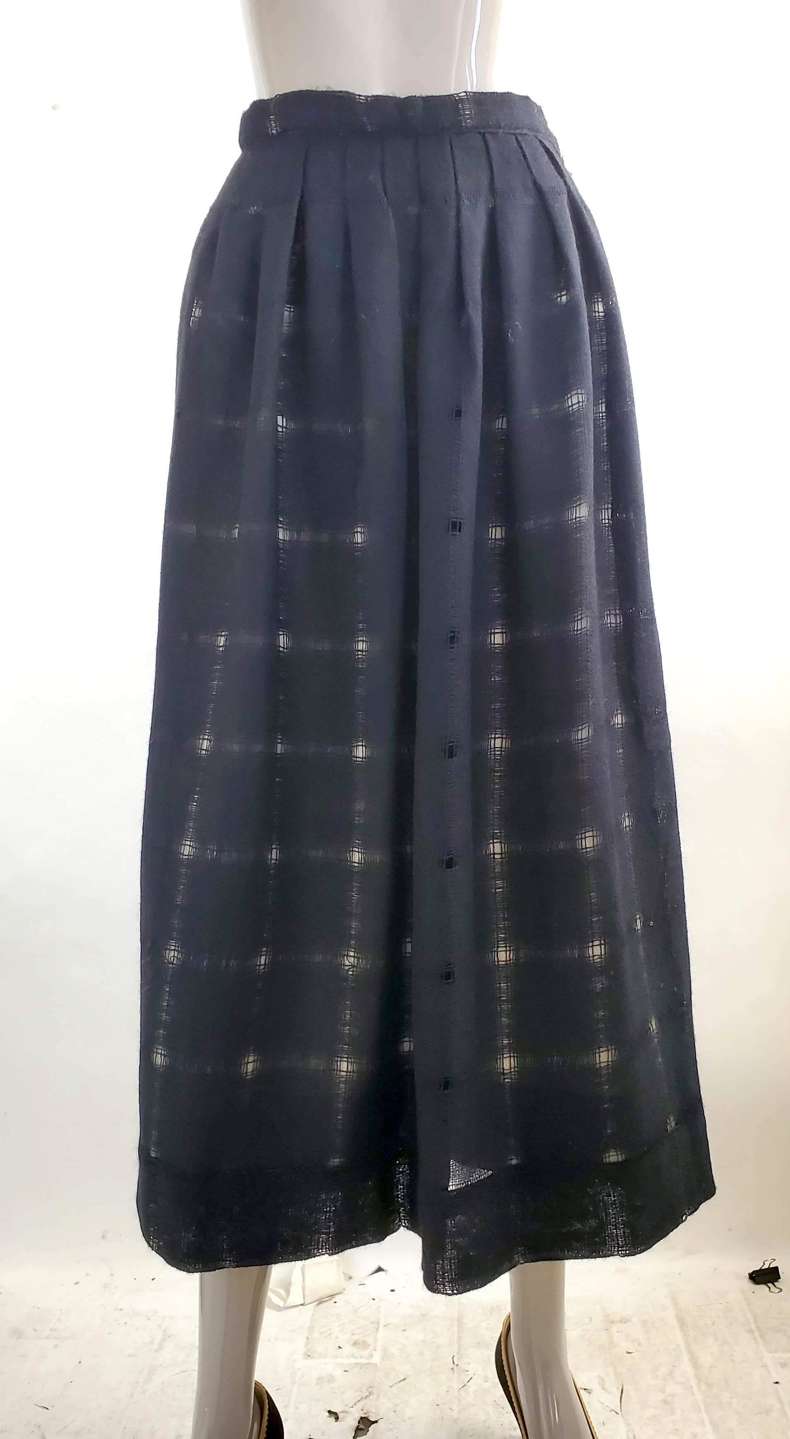 Sybil Connolly Black Wool Skirt, 1970s: Sybil Connolly Demi Couture Black Wool Skirt with silk lining, 1970s.