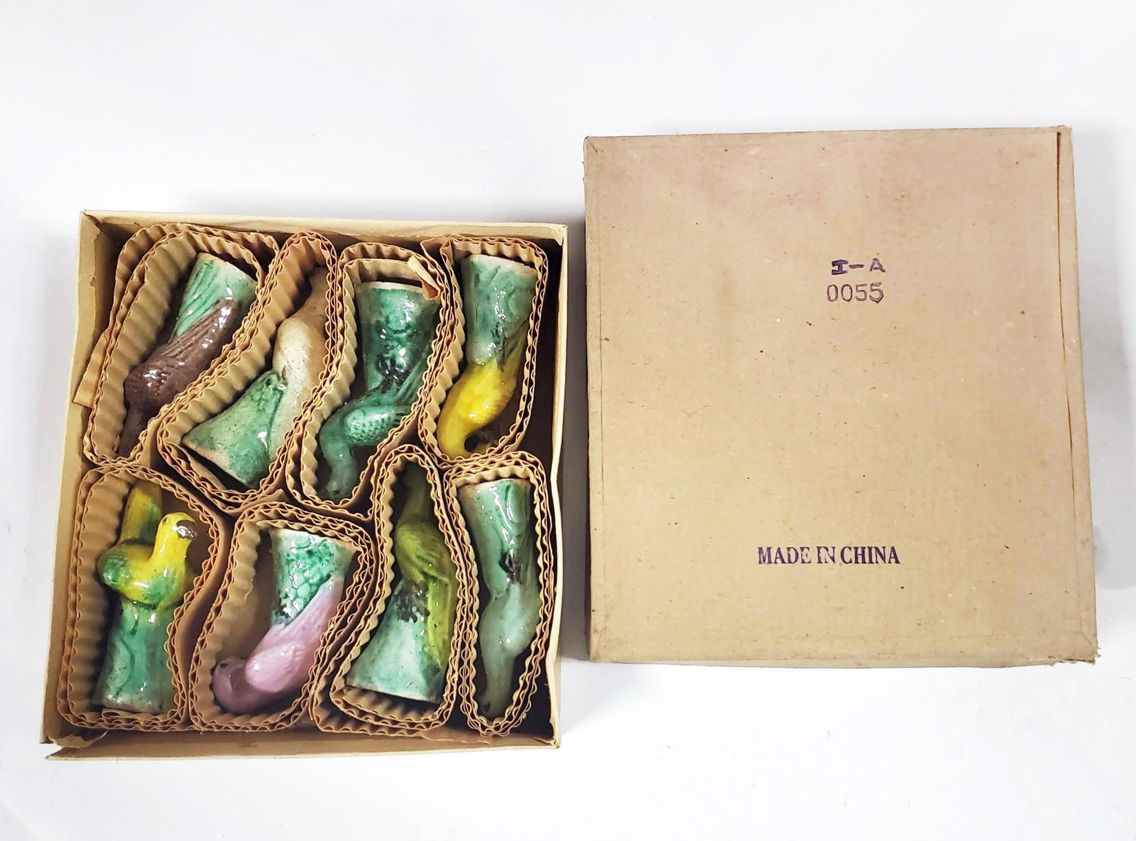 Set of 8 Chinese Ceramic Birds: Set of 8 Chinese Ceramic Birds. H. 3 in. New old stock in original box. Ca. mid 20th century.