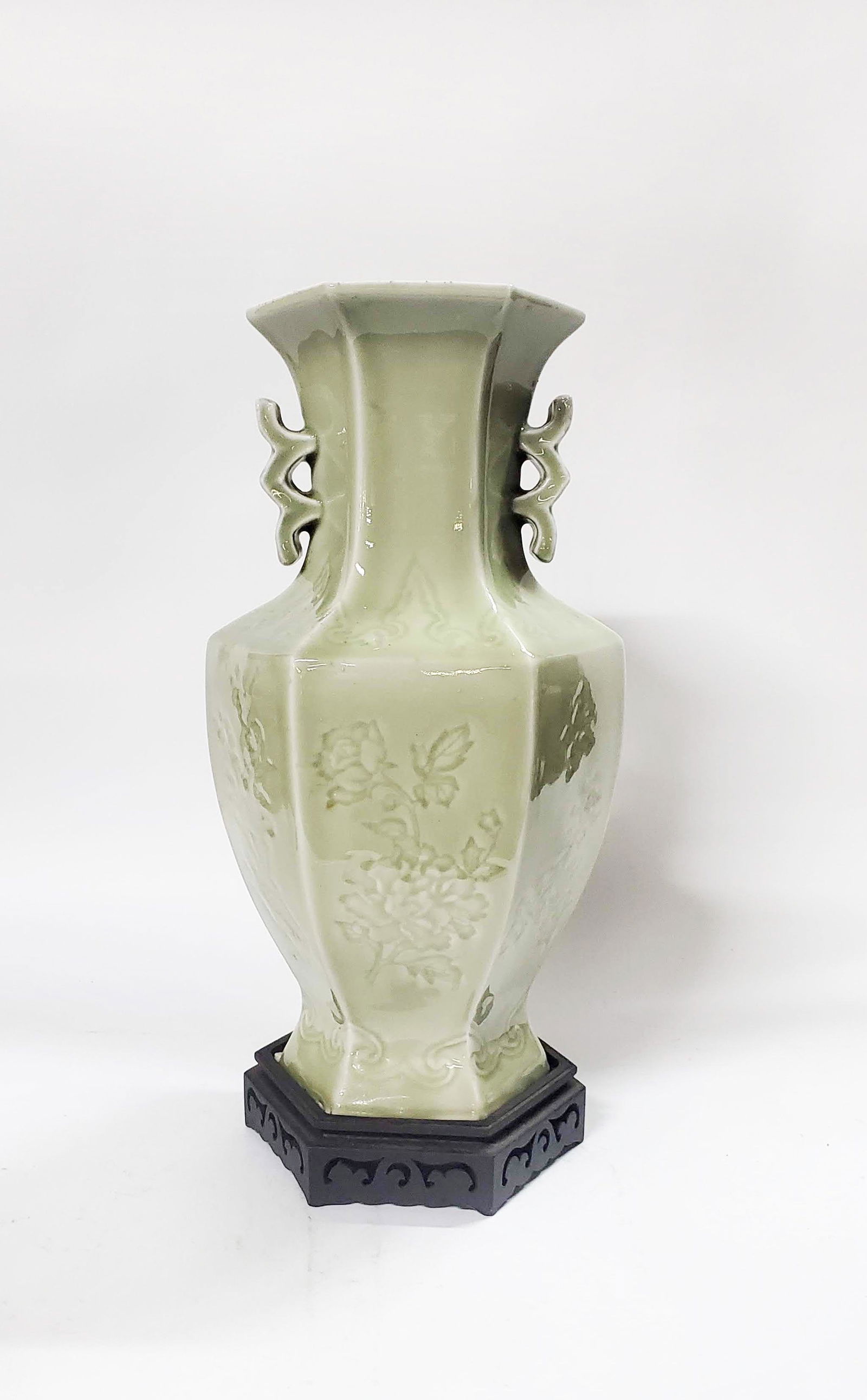 Chinese Celadon Hexagon Shaped Vase: Chinese Celadon Hexagon Shaped Vase with wooden stand, ca. 20th century. H. 15.75 inches (with stand).
