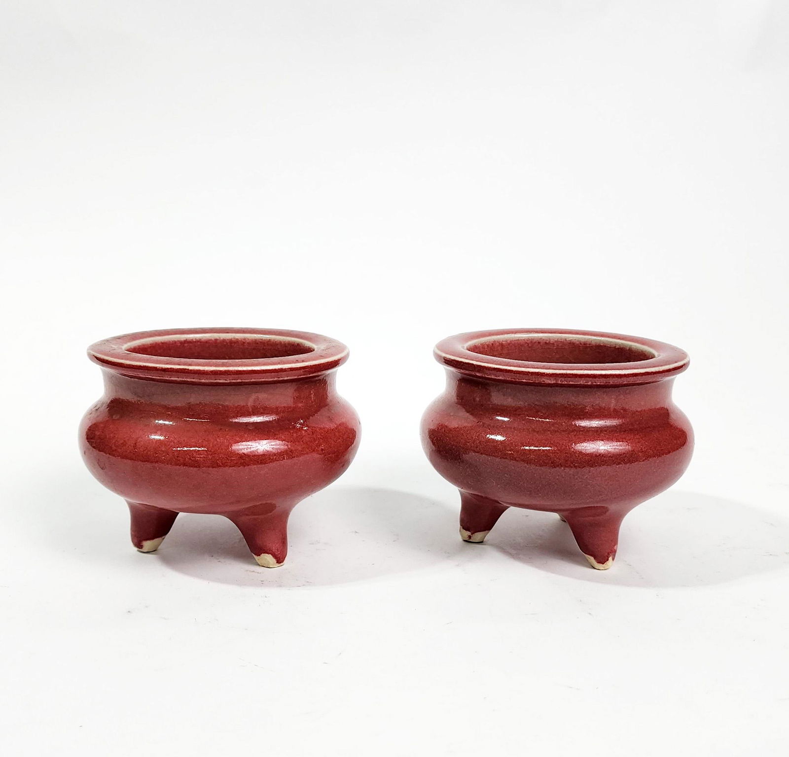 Pair of Chinese Red Glazed Tripod Censers (1 of 4)