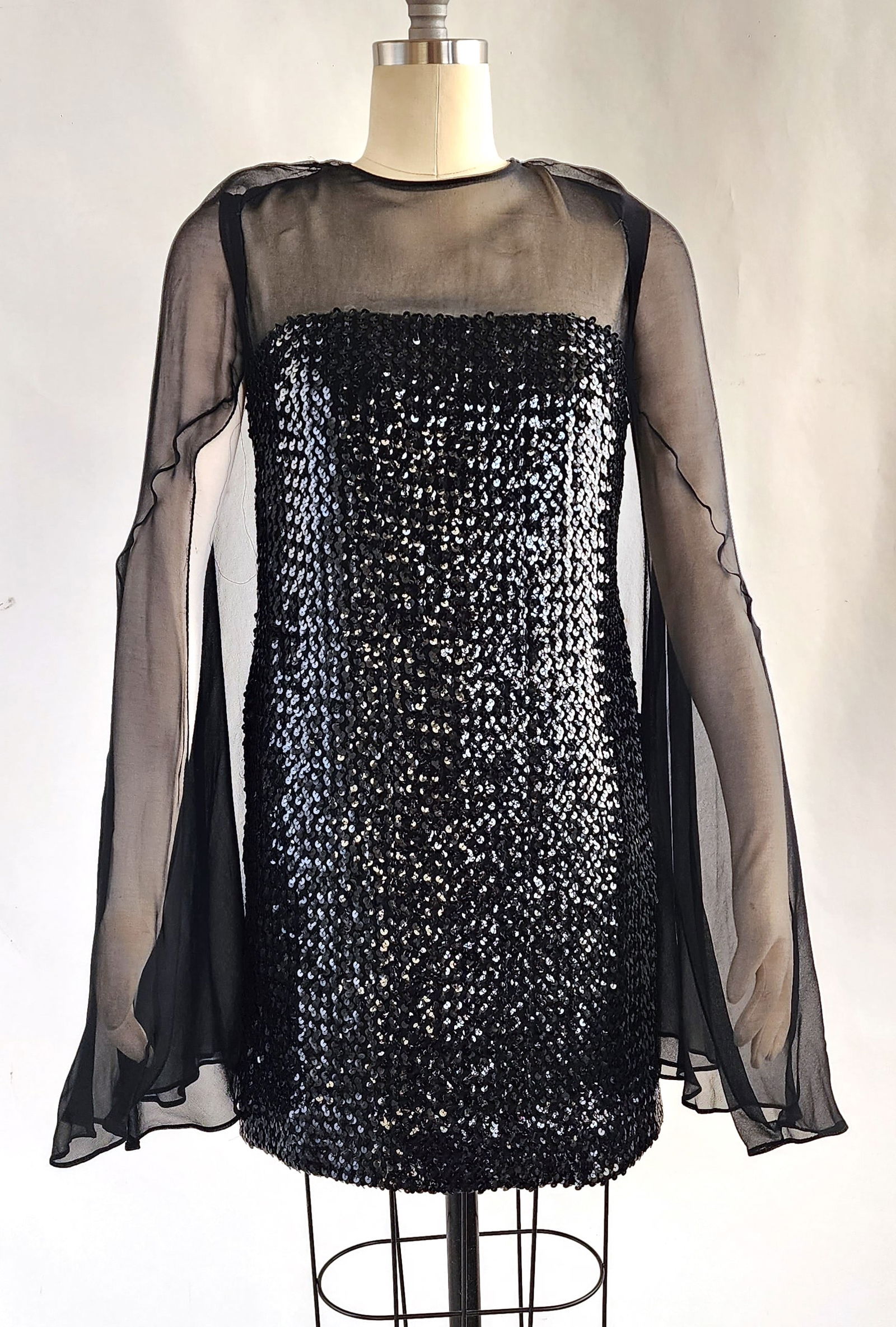 1960s Black Sequined & Chiffon Dress: 1960s Black Sequined & Chiffon Dress. Armpit to armpit 16 1/2 in. Provenance; What Goes Around Comes Around.