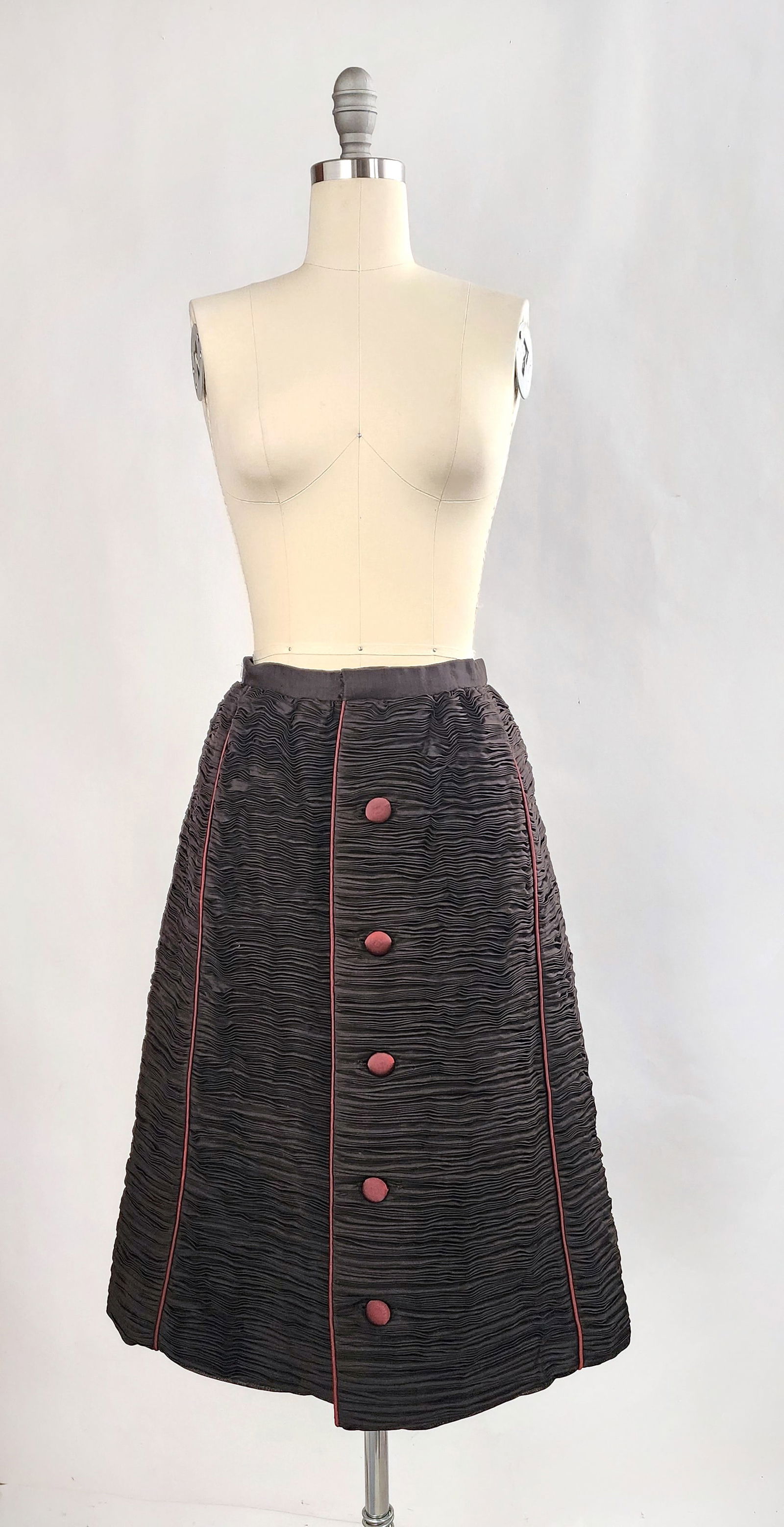 Sybil Connolly Haute Couture Brown Pleated Linen Skirt, ca. 1970s: Sybil Connolly Haute Couture Brown Pleated Linen Skirt, ca. 1960-70s. Lined with silk taffeta.