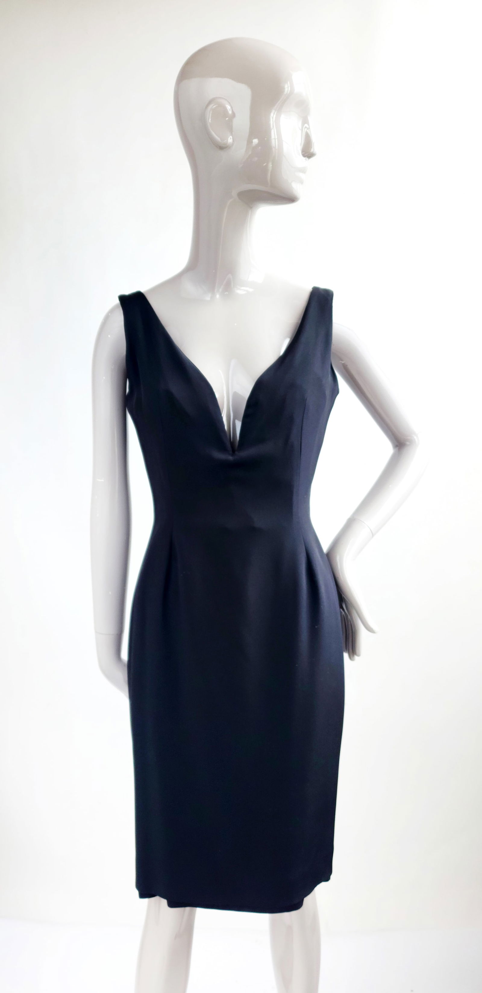 Antony Price Black Dress with Deep Decollete, ca. 1980s: Antony Price Black Dress with Deep Decollete, ca. 1980s. It has a boned inner bodice.