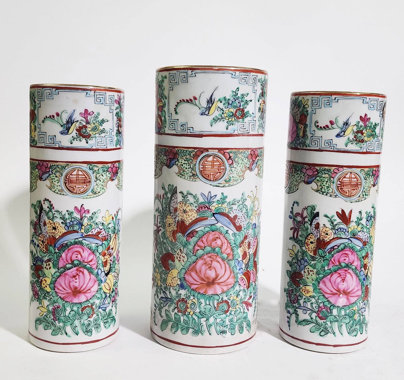 Lot of 3 Chinese Famille Rose Medallion Cylindrical Vases: Lot of 3 Chinese Famille Rose Medallion Cylindrical Vases, ca. 1950s. Made in Hong Kong. Tallest h. 9.75 inches.