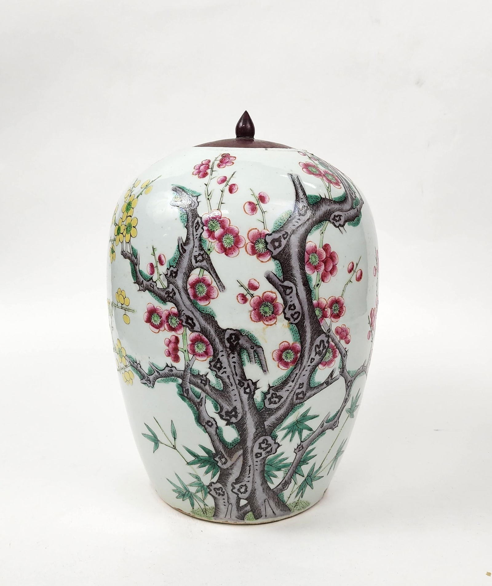 Antique Chinese Famille Rose Porcelain Jar: Antique Chinese Famille Rose Porcelain Jar with later wooden lid, h. 11 inches, ca. late 19th- early 20th century.