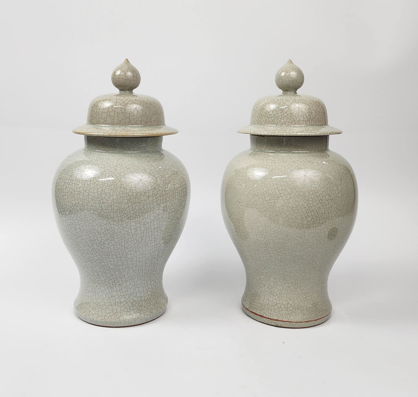 Pair of Chinese Export Crackle Glazed Porcelain Jars: Pair of Chinese Export Crackle Glazed Porcelain Jars, h. 12.25 inches, Qianlong marked, ca. mid 20th century. Provenance: Estate of a New York collector/ dealer. The collection assembled between early
