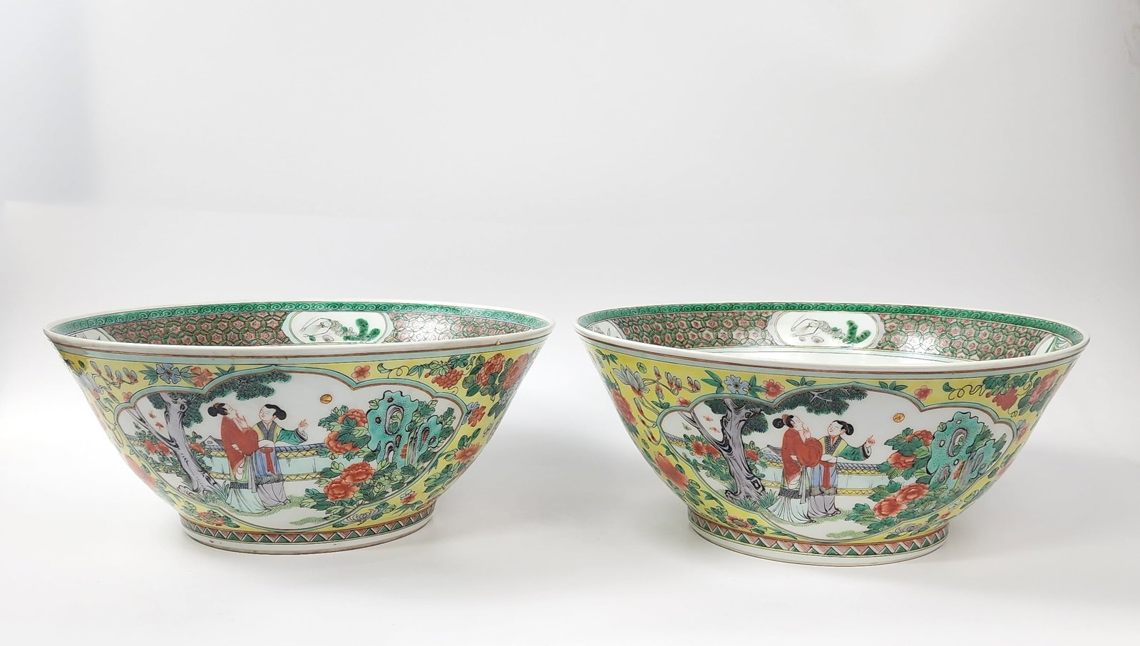 Pair of Chinese Famille Rose Yellow Ground Large Porcelain Bowls: Pair of Chinese Famille Rose Yellow Ground Large Porcelain Bowls , d. 13 inches, h. 5.5 inches., Kangxi marked, circa 20th century. Provenance: Estate of a New York collector/ dealer. The collection a