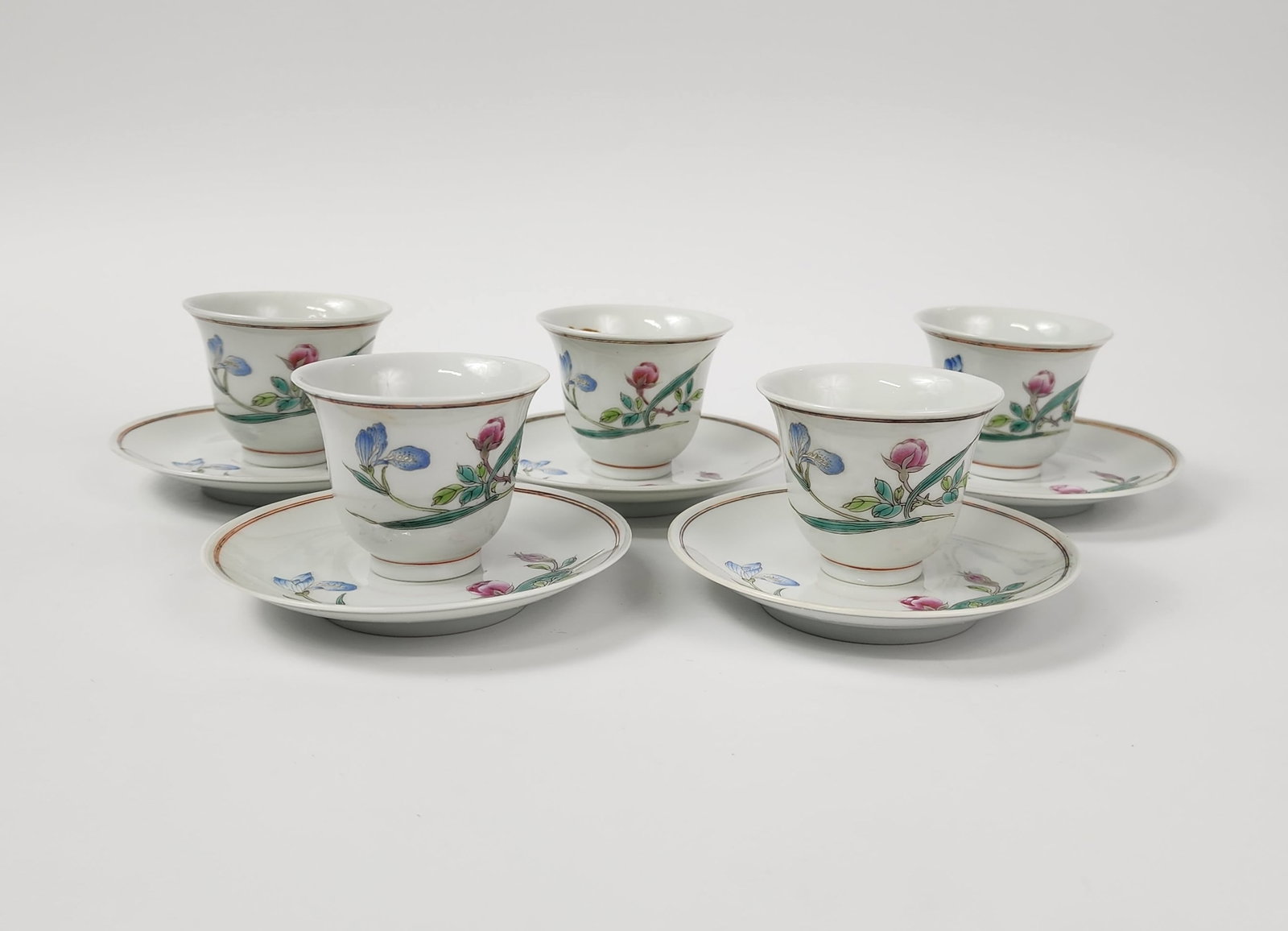 Set of 10 Chinese Jingdezhen Famille Rose Porcelain Wine Cups & Saucers: Set of 10 Chinese Jingdezhen Famille Rose Porcelain Wine Cups & Saucers, cups- h. 2 inches, saucers- h. 3 7/8 inches, Jindezhen Zhi marked, circa 1950s-60s. Provenance: Estate of a New York collector/