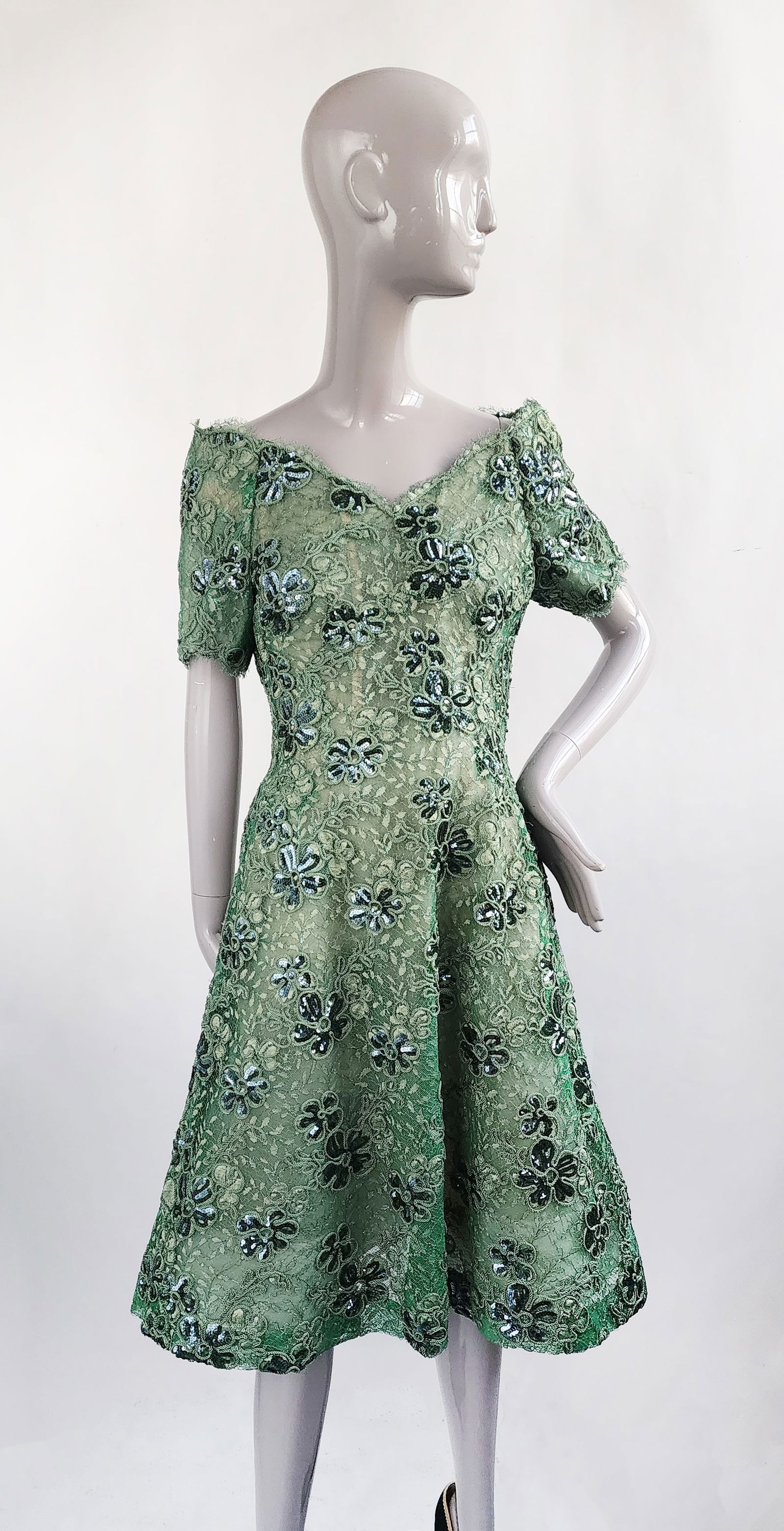 Arnold Scaasi Custom Made Embroidered Green Lace Cocktail Dress, 1980s: Arnold Scaasi custom made embroidered green lace cocktail dress, circa mid to late 1980s. Provenance: Estate of Mary Stone Phipps (1936-2022) (Mrs. Howard Phipps Jr.), Erchless House, Old Westbury, NY