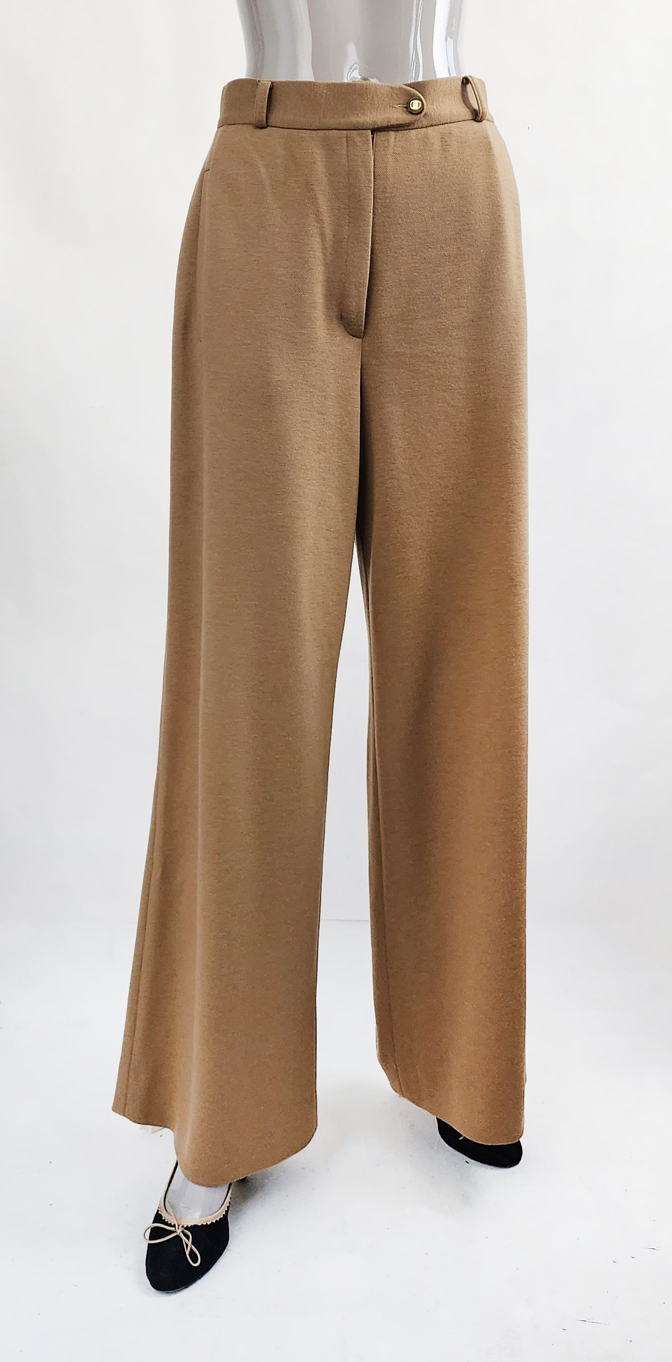 Salvatore Ferragamo Camel Brown Wool Knit Pants, c. 1990s: Salvatore Ferragamo camel brown wool knit pants with logo button, c. 1990s. Made in Italy. Size label 12, approximately modern size US 8. Provenance: Estate of Mary Stone Phipps (1936-2022) (Mrs. Howa