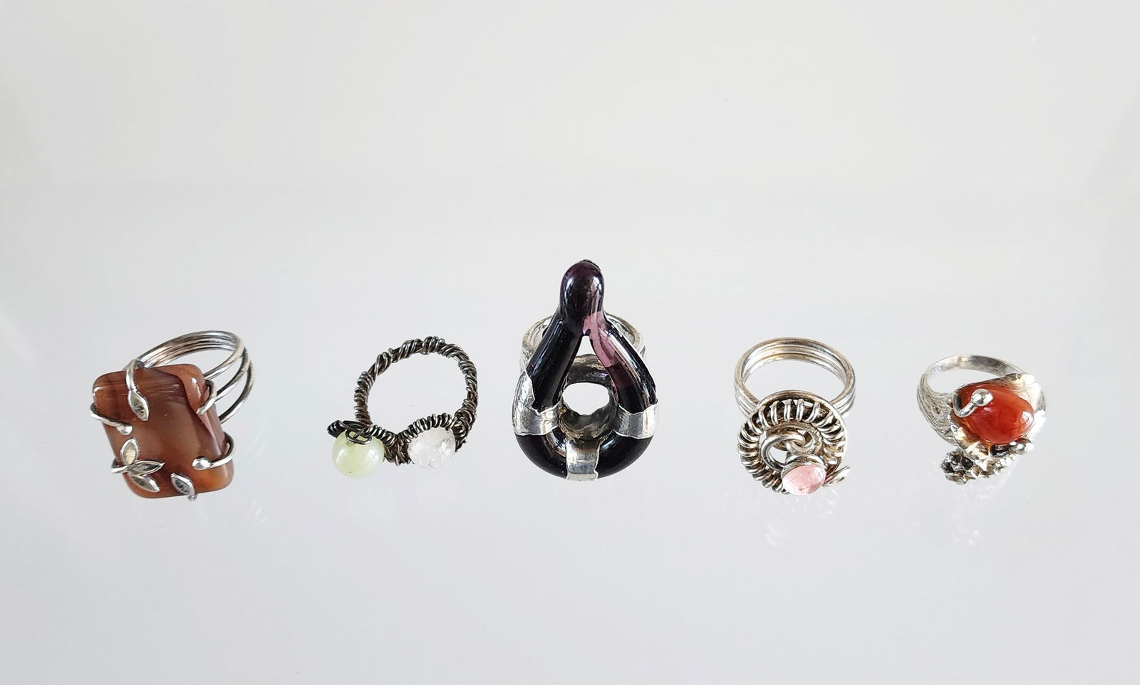 Lot of 5 Estate Contemporary Designer Sterling Silver Rings, Sz 7-8.25: Lot of 5 Estate Contemporary Designer Sterling Silver Rings. Size- between 7 to 8.25. Marks: one marked 925, other unmarked. Total weight: 41 grams. Provenance: Estate of Victoria Salter (1944-2024) V