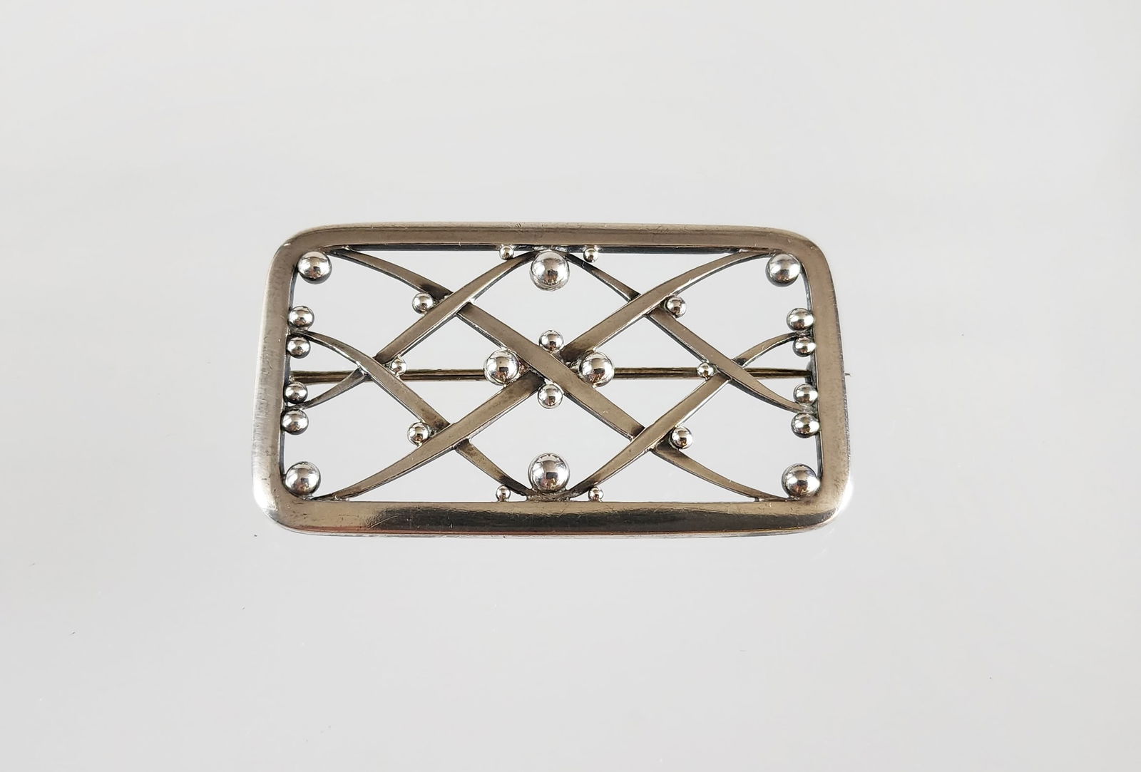 Estate Vintage Georg Jensen Sterling Silver Trellis Brooch: Estate Vintage Georg Jensen Sterling Silver Trellis Brooch. Size 2 1/8 x 1 1/4 inches. Marks: Georg Jensen/ Sterling/ Denmark/ 266. Total weight: 11.2 grams. Provenance: Estate of Victoria Salter (194