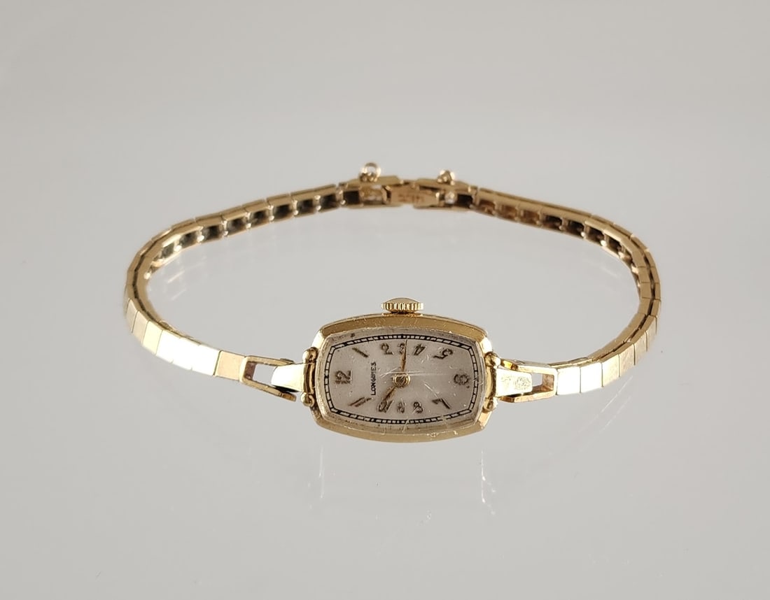 Estate Vintage Longines 14K Gold Ladies Watch, ca. 1943: Estate Vintage Longines Cal. 5L 14K Gold Ladies Watch, ca. 1943. Marks:Keystone/ 14K (case)/ 14K TL?(bracelet) Total weight: 16 grams. Gold weight: 12 grams. Provenance: Estate of Victoria Salter (194