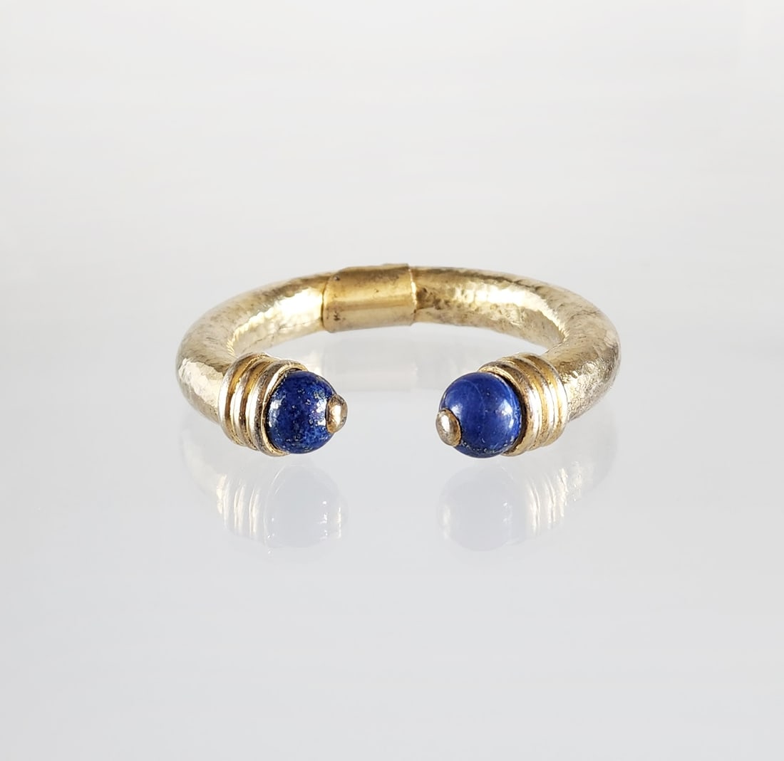Estate Vintage Ancient Greek Style Hammered & Gold Washed 950 Silver Bangle with Lapis Stones: Estate Vintage Ancient Greek Style Hammered & Gold Washed Silver (0.950 purity) Spring Hinged Open Bangle with Lapis Stones. In style of Lalaounis. Marks:950 Total weight: 54 grams. Provenance: Estate